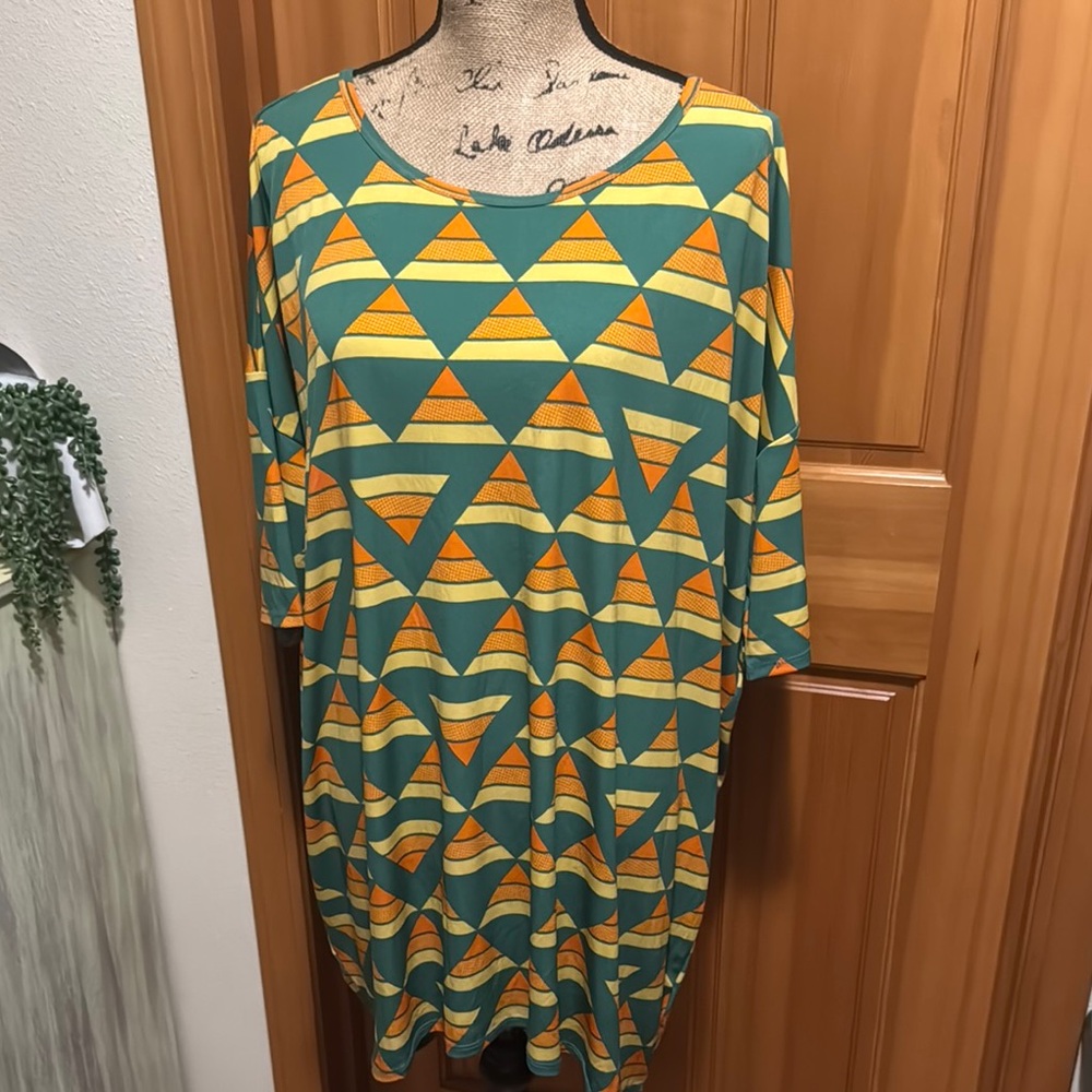 LuLaRoe Irma Geometric Green and Yellow Tunic Slinky material!